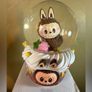 Brand New Labubu Snow Globe, Cute Cupcake Base, Lights up & Plays Calm Music